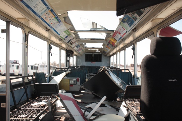 Seats and electrical parts have been salvaged from this bus.