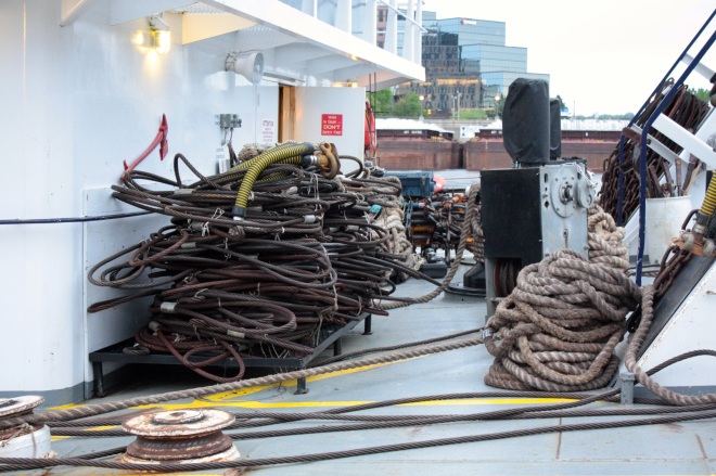 Cables and lines are ready for crew members to use when they attach barges. 