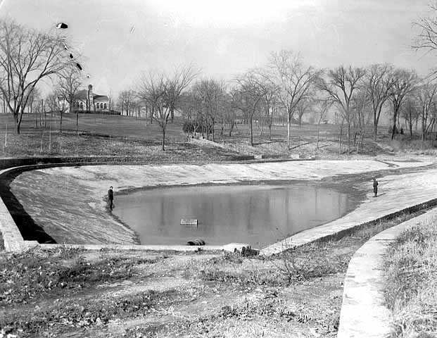 This is what the original Highland Park Pool looked like in 1935. The building in the background is the golf clubhouse, which still stands. Courtesy Minnesota Historical Society.