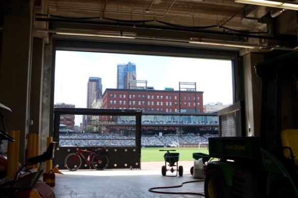 This vantage point is from inside the service entrance/loading dock of CHS Field. Equipment for field upkeep are stored here. One of two gates is open during field maintenance prior to a game.