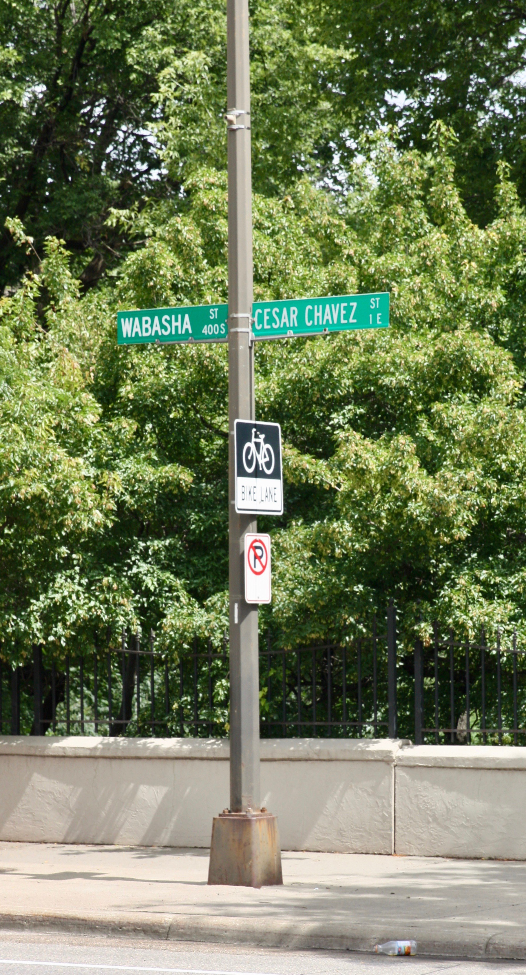 Street signs pointing out the change from Wabasha to Cesar Chavez Street.)