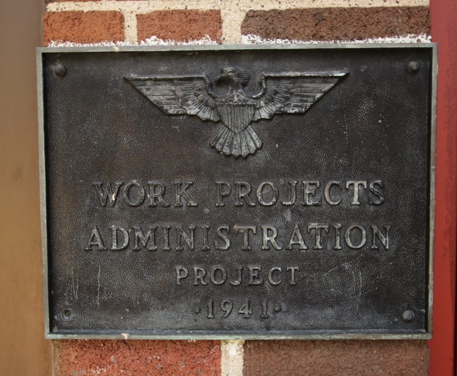 The WPA plaque on one of the buildings.